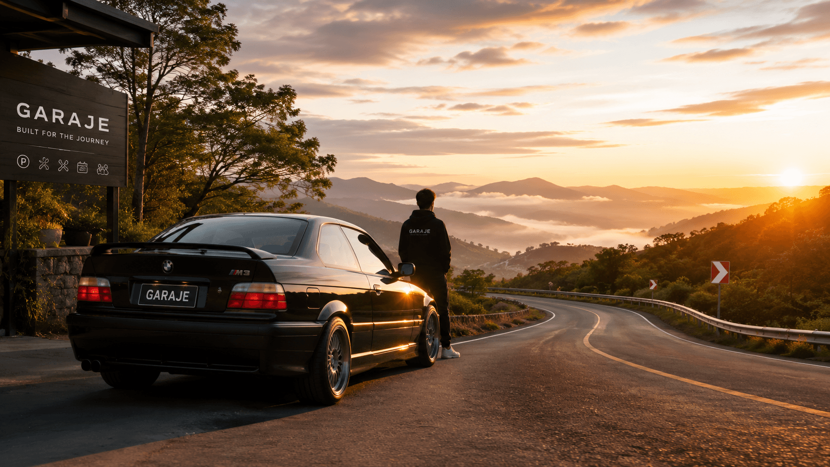 A driver standing beside a coupe on a winding mountain road at sunrise